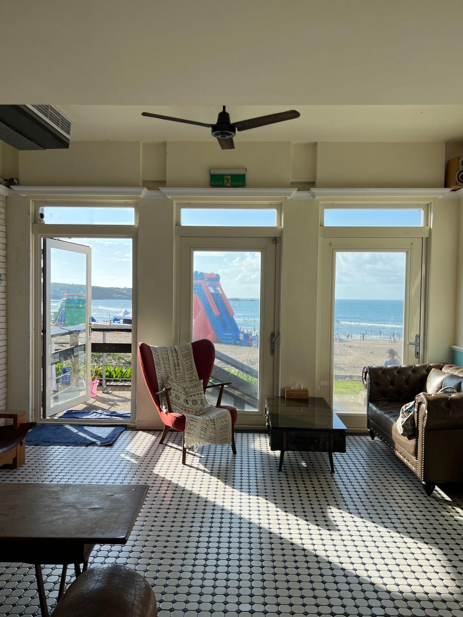 Bright, clean Old Town Seal Beach cottage interior with light wood floors near the beach