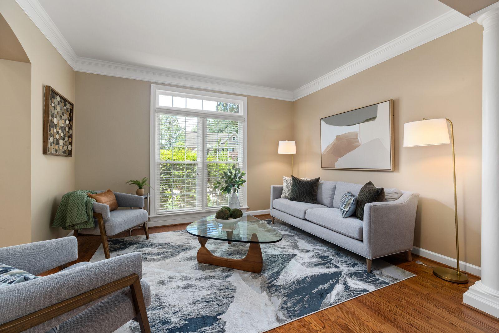 Clean, light-filled interior of an East Lake Village home with lake-facing windows